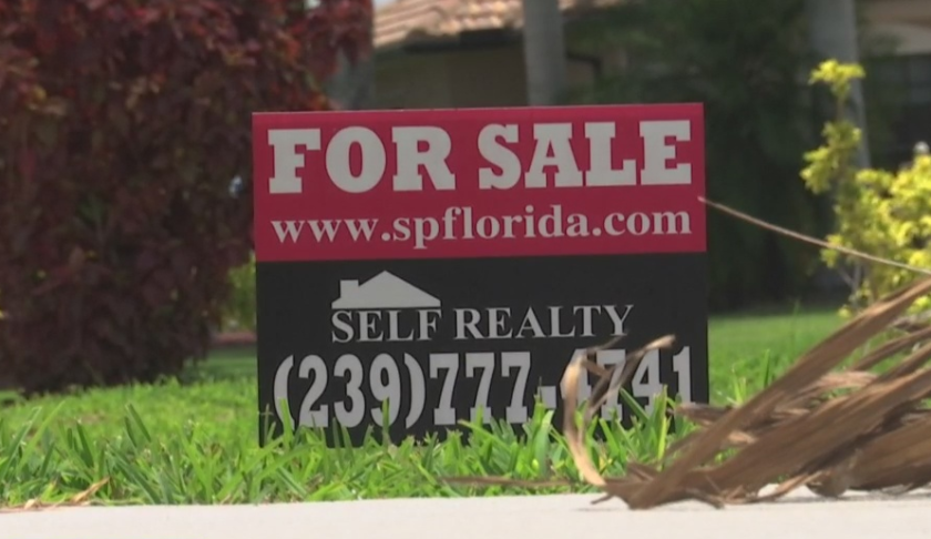 For sale sign in front of a Cape Coral home. (Credit: WINK News)