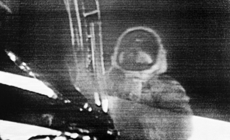 In this July 20, 1969 image made from television, Apollo 11 astronaut Neil Armstrong steps onto the surface of the moon. Millions on Earth who gathered around the TV and radio heard Armstrong say this: “That's one small step for man, one giant leap for mankind.” But after returning from space, he immediately insisted that he had been misquoted. He said there was a lost word in his famous one-liner from the moon: “That's one small step for ‘a' man." It's just that people just didn't hear it.” (NASA via AP)