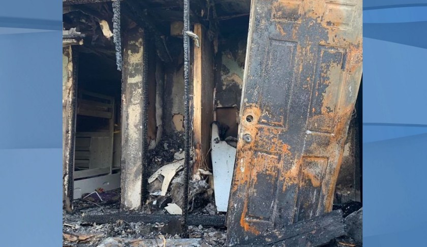 North Fort Myers mobile home after the fire, where their dog died. (Credit: WINK News)