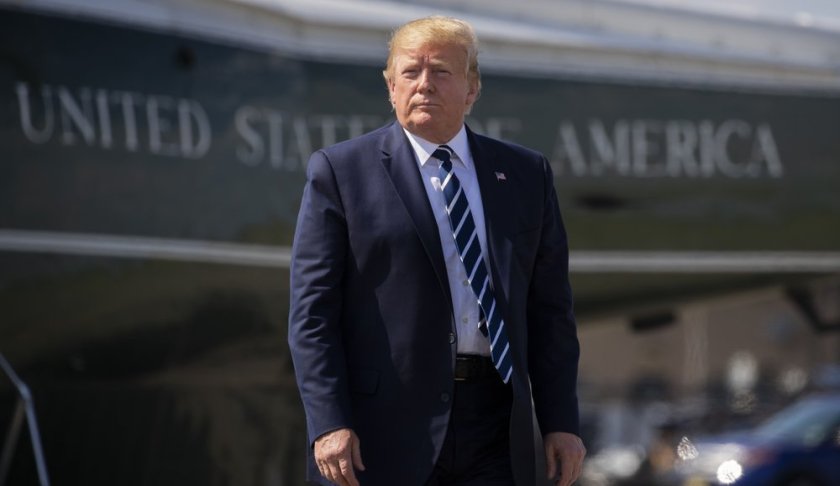 FILE - In this Sunday, July 21, 2019 file photo, President Donald Trump walks on the tarmac to board Air Force One at Morristown Municipal Airport, in Morristown, N.J. Iran said Monday that it has arrested 17 Iranian nationals allegedly recruited by the Central Intelligence Agency to spy on the country's nuclear and military sites, and some of them have already been sentenced to death. Trump tweeted that the claim had "zero truth," calling Iran a "total mess."(AP Photo/Manuel Balce Ceneta, File)