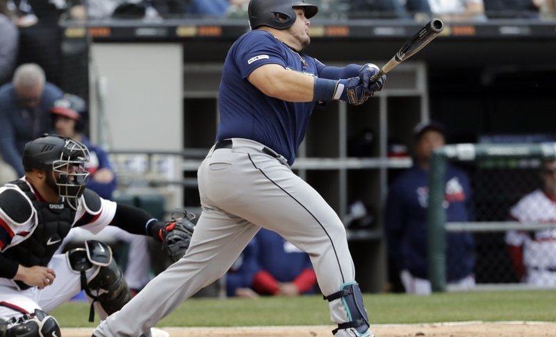 Seattle Mariners' Daniel Vogelbach hits a three-run double against the Chicago White Sox during the third inning of a baseball game in Chicago, Sunday, April 7, 2019. (AP Photo/Nam Y. Huh)