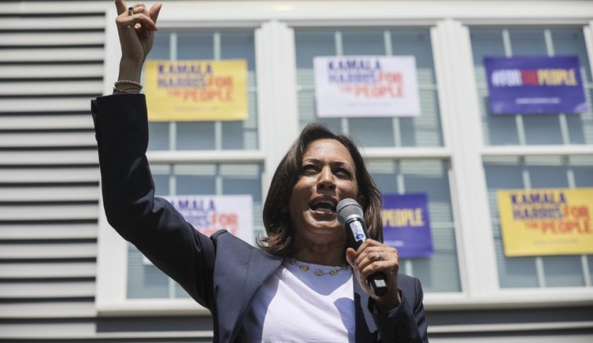 Supporters applaud as Democratic presidential candidate, U.S. Sen. Kamala Harris, D-Calif., gestures while speaking at a house party in Gilford, N.H., Sunday, July 14, 2019. (AP Photo/ Cheryl Senter)
