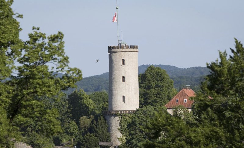 FILE - In this May 27, 2017 file photo, a castle is pictured in Bielefeld, Germany. The Germany city that’s been the subject of a long-running online conspiracy theory claiming it doesn’t really exist is offering big bucks to whoever proves that’s true. City officials in Bielefeld said Wednesday they’ll give 1 million euros ($1.1 million) to the person who delivers solid proof of its non-existence. (Friso Gentsch/dpa via AP)