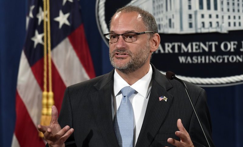 FILE - In this July 19, 2019, file photo, acting Director of the Bureau of Prisons Hugh Hurwitz speaks during a news conference at the Justice Department in Washington. Hurwitz has been removed from his post more than a week after millionaire financier Jeffrey Epstein took his own life while in federal custody. Attorney General William Barr announced Hugh Hurwitz’s termination Monday, Aug. 19. (AP Photo/Susan Walsh, File)
