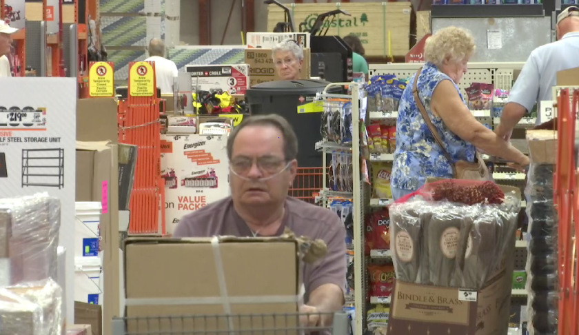 Customers shopping for emergency supplies at Home Depot. (Credit: WINK News)