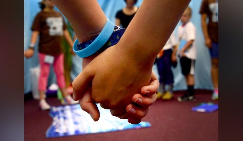 Kids holding hands, generic (US Air Force / Nick Daniello via MGN)