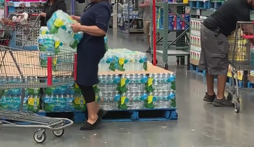 People load up on water Wednesday as Hurricane Dorian approaches Florida. (Credit: WINK News)