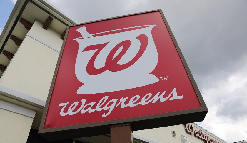 Sign advertising a Walgreens store. (Credit: CBS)