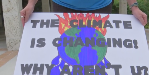Sign from a protester at the Naples rally Friday. (Credit: WINK News)