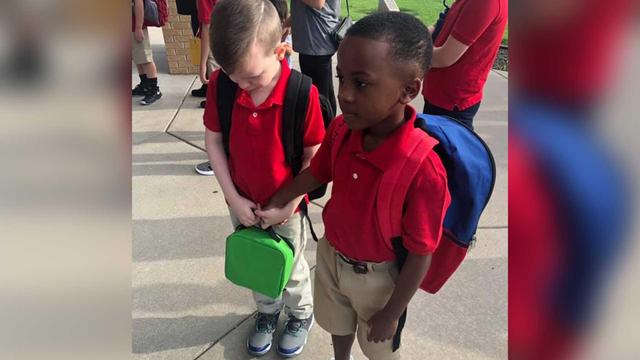 8-year-old boy consoles crying classmate with autism on first day of school (Courtney Moore via CBS)