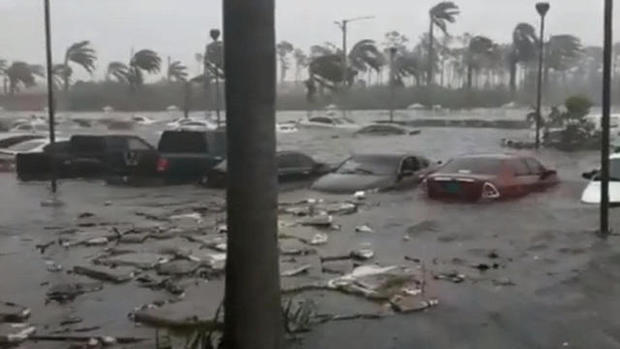 The deadly storm, which was stuck in place over the island nation, has been pounding the northern Bahamas for nearly two days. (CBSNews)