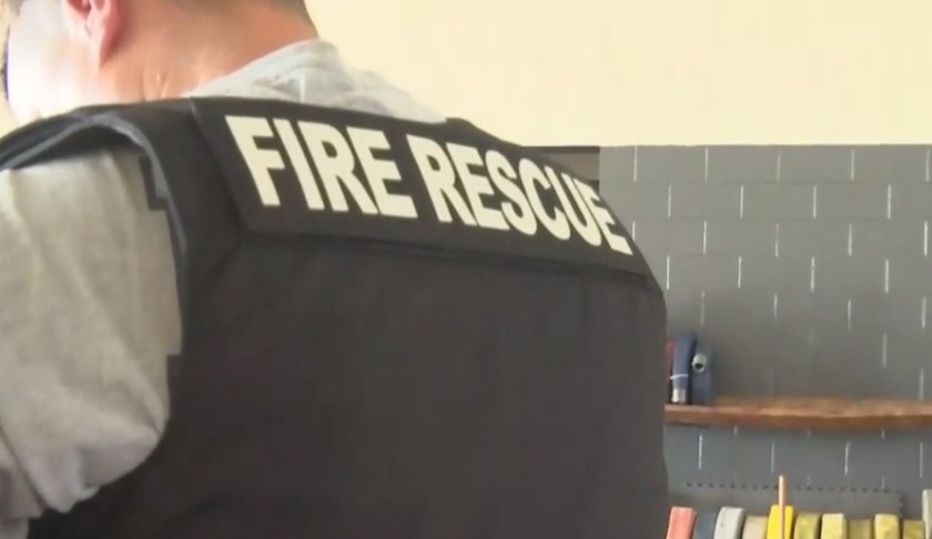 Firefighter wears a bullet proof vest. (Credit: WINK News)