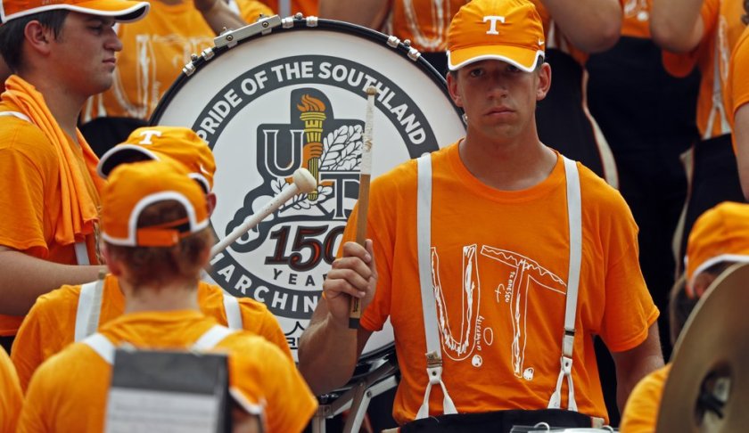 Members of the Pride of the Southland band perform as they wear the University of Tennessee superfan shirt after designing his own UT shirt and wearing it to his school before an NCAA college football game against Chattanooga Saturday, Sept. 14, 2019, in Knoxville, Tenn. (AP Photo/Wade Payne)