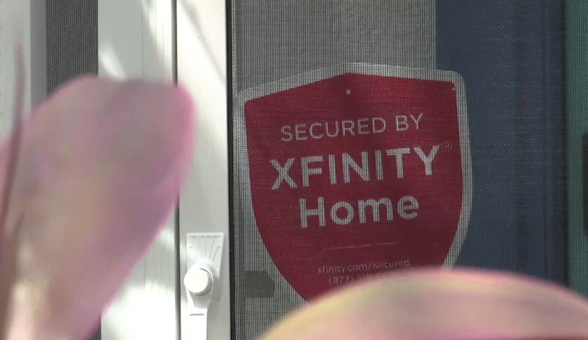 Sign warning intruders the house has Xfinity Home Security. (Credit: WINK News)