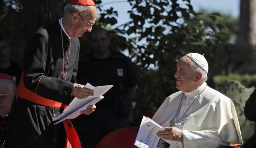 Cardinal Claudio Hummes, General Rapporteur for the Synod of Bishops for the Pan-Amazon region, left, shares a word with Pope Francis on the occasion of the feast of St. Francis of Assisi, the patron saint of ecology, in the Vatican gardens, Friday, Oct. 4, 2019. The ceremony takes place two days before a Synod of bishops on the Pan-Amazon region opens at the Vatican to address the ecological, social and spiritual needs of indigenous peoples in the Amazon. (AP Photo/Alessandra Tarantino)