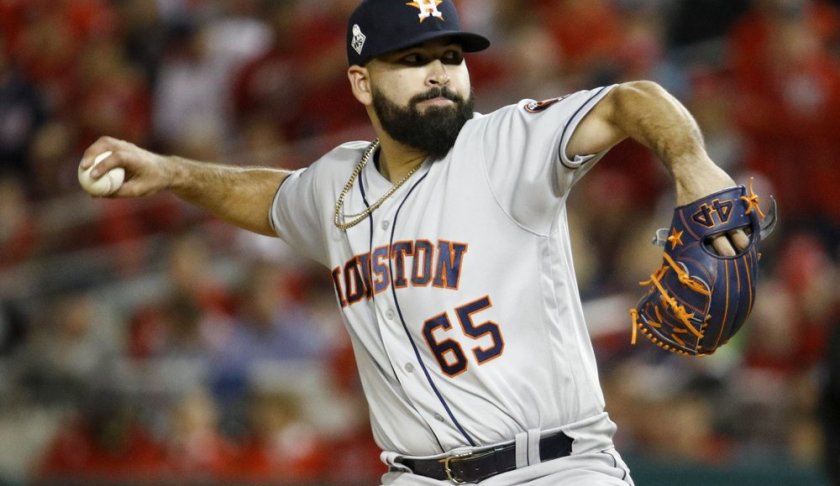 Houston Astros starting pitcher Jose Urquidy throws against the Washington Nationals during the first inning of Game 4 of the baseball World Series Saturday, Oct. 26, 2019, in Washington. (AP Photo/Patrick Semansky)