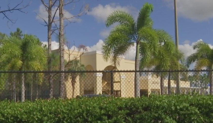 Outside of the school with her name. (Credit: WINK News)