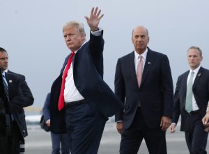 FILE - In this Tuesday, July 10, 2018, file photo, President Donald Trump is joined by Gordon Sondland, the U.S. ambassador to the European Union, second from right, as he arrives at Melsbroek Air Base, in Brussels, Belgium. According to text messages released the first week of October 2019 by House investigators, Ambassador Gordon Sondland and Kurt Volker, a former special envoy to Ukraine, discussed Trump wanting to press Ukrainian President Volodymyr Zelenskiy to investigate Trump's Democratic political rival Joe Biden and his family. The House Intelligence Committee is scheduled to meet in private with Sondland. (AP Photo/Pablo Martinez Monsivais, File)