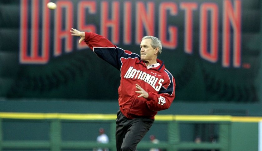 FILE - In this April 14, 2005, file photo, President George W. Bush throws out the ceremonial first pitch at the Washington Nationals home opener in Washington. (AP Photo/Evan Vucci, file)