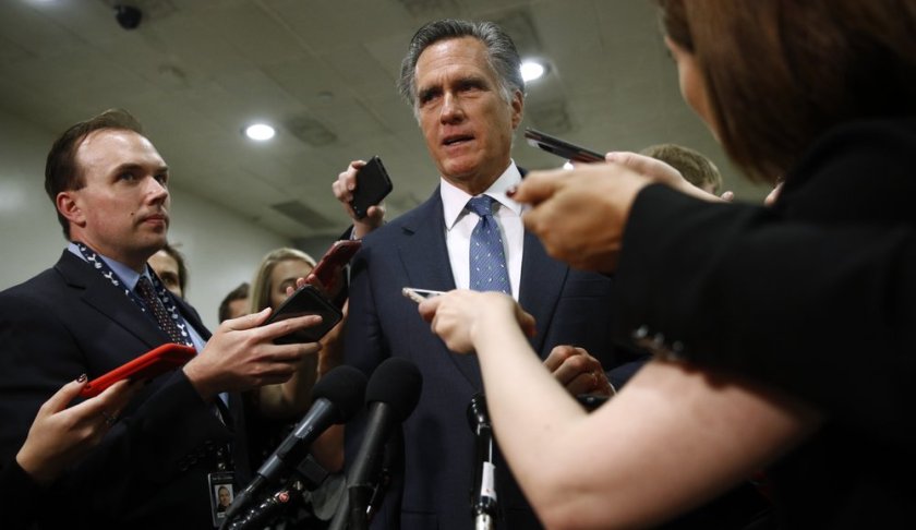 FILE - In this May 21, 2019 file photo, Sen. Mitt Romney, R-Utah, speaks to reporters after a classified members-only briefing on Iran, Capitol Hill in Washington. Romney’s ratcheted-up rhetoric on President Donald Trump is again raising hopes among Trump detractors that the senator could play a key role in the unfolding impeachment saga, though the historic shifts in their relationship mean Romney’s next move is an open question. (AP Photo/Patrick Semansky, File)