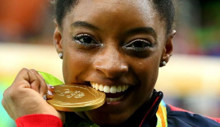Simone Biles sets record for most world gymnastics championship medals. (Credit: CNN)