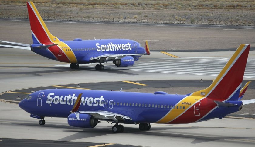 FILE - This July 17, 2019 photo shows Southwest Airlines planes at Phoenix Sky Harbor International Airport in Phoenix. (AP Photo/Ross D. Franklin, File)