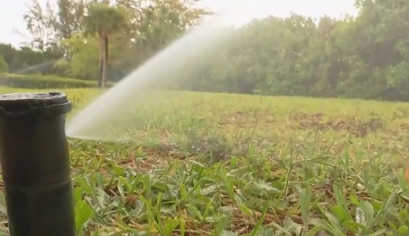 Sprinklers at a Charlotte County homeowner's backyard. (Credit: WINK News)