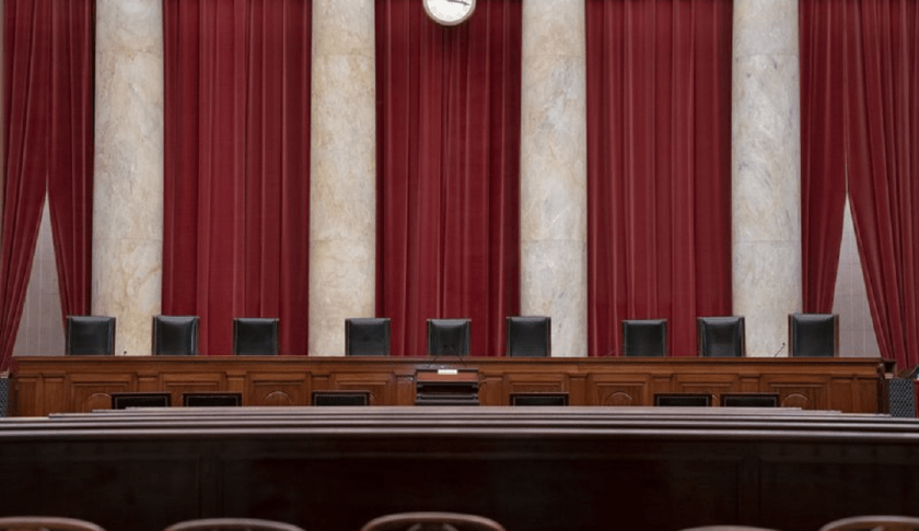 FILE - In this June 24, 2019 file photo, the empty courtroom is seen at the U.S. Supreme Court in Washington. (AP Photo/J. Scott Applewhite)