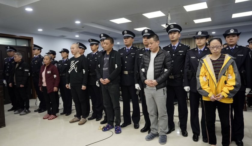 A trial continues as fentanyl drug traffickers are sentenced in court, Thursday, Nov. 7, 2019, in Xingtai, north China's Hebei Province. The court sentenced at least nine fentanyl traffickers Thursday in a case that was a culmination of a rare collaboration between Chinese and U.S. law enforcement to crack down on global networks that manufacture and distribute lethal synthetic opioids. (Jin Liangkuai/Xinhua via AP)