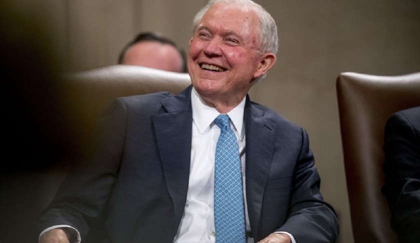 FILE - In this May 9, 2109, file photo, former Attorney General Jeff Sessions smiles during a farewell ceremony for Deputy Attorney General Rod Rosenstein in the Great Hall at the Department of Justice in Washington. Sessions is planning to run for his former Senate seat in Alabama. (AP Photo/Andrew Harnik, File)