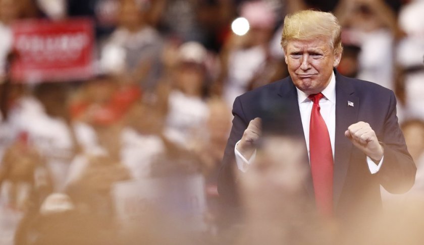 President Donald Trump reacts to the crowd before he speaks during a rally on Tuesday, Nov. 26, 2019, in Sunrise, Fla. (AP Photo/Brynn Anderson)
