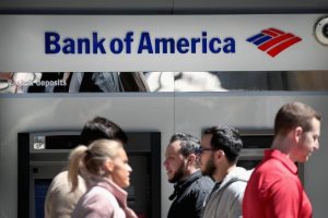 The American job market remains tight, and banks are scrambling to find people who want to work at their branches. That's why Bank of America is raising its minimum wage to $20 an hour in 2020 — a year earlier than expected. (Credit: Scott Olson/Getty Images)