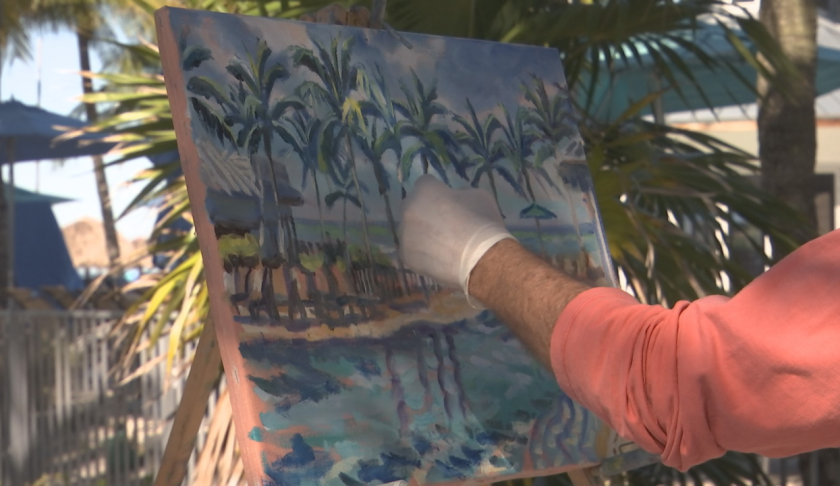 SWFL artists paint for people in need of legal services. (Credit: WINK News)