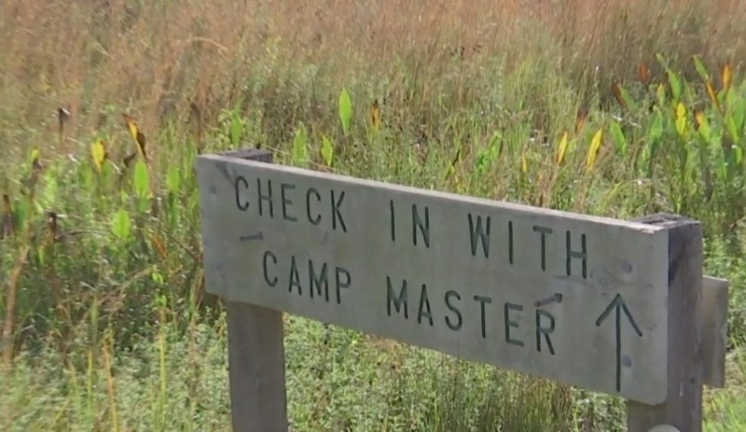 Sign showing the entrance to the camp. (Credit: WINK News)