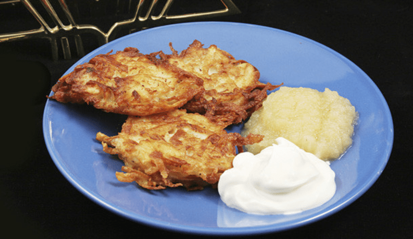 During the Jewish holiday, eating crispy, fried, slightly oniony potato pancakes represents perseverance, and a little bit of magic. (Credit: CBS New York)