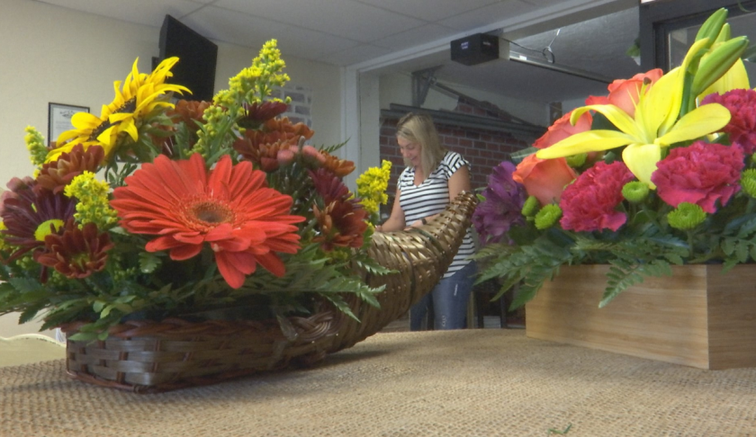 Lee County florist makes bouquets and a difference. (Credit: WINK News)