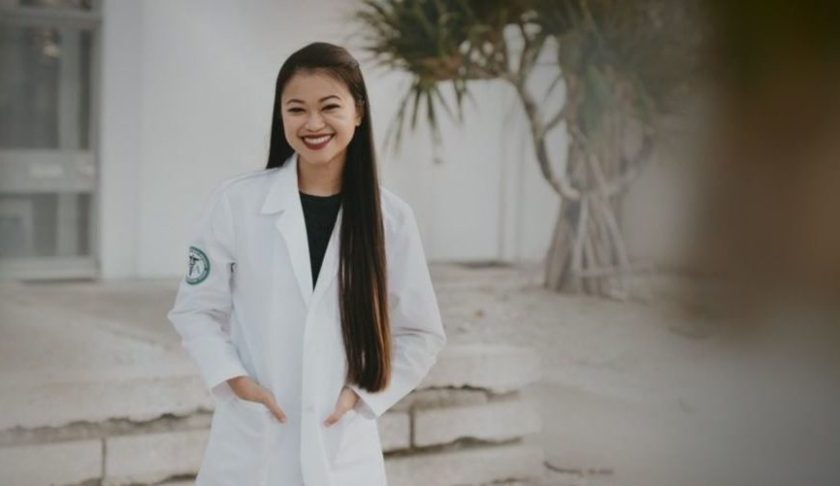 Tori McQuade trades in her graduation gown for a white coat. (Credit: WINK News)