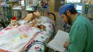 Hospital worker who reads to children fighting for life seeks book donations. (Credit: CBS Iowa)