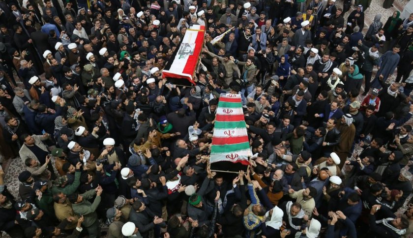 Mourners carry the coffins of Iran's Gen. Qassem Soleimani and Abu Mahdi al-Muhandis, deputy commander of Iran-backed militias at the Imam Ali shrine in Najaf, Iraq, Saturday, Jan. 4, 2020. Iran has vowed "harsh retaliation" for the U.S. airstrike near Baghdad's airport that killed Tehran's top general and the architect of its interventions across the Middle East, as tensions soared in the wake of the targeted killing. (AP Photo/Anmar Khalil)