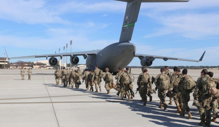 This handout picture released by the US Army shows paratroopers assigned to the 2nd Battalion, 504th Parachute Infantry Regiment, 1st Brigade Combat Team, 82nd Airborne Division, deploy from Pope Army Airfield, North Carolina on January 1, 2020. - Paratroopers from 2nd Battalion, 504th Parachute Infantry Regiment, 1st Brigade Combat Team, 82nd Airborne Division were activated and deployed to the U.S. Central Command area of operations in response to recent events in Iraq. (Photo by Capt. Robyn Haake / US ARMY / AFP) / RESTRICTED TO EDITORIAL USE - MANDATORY CREDIT "AFP PHOTO / Capt. Robyn J. Haake / US ARMY " - NO MARKETING - NO ADVERTISING CAMPAIGNS - DISTRIBUTED AS A SERVICE TO CLIENTS (Photo by CAPT. ROBYN HAAKE/US ARMY/AFP via Getty Images)