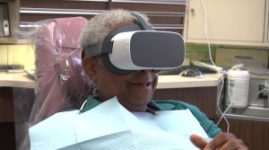 Patient uses VR technology while at the dentist. (Credit: WINK News)