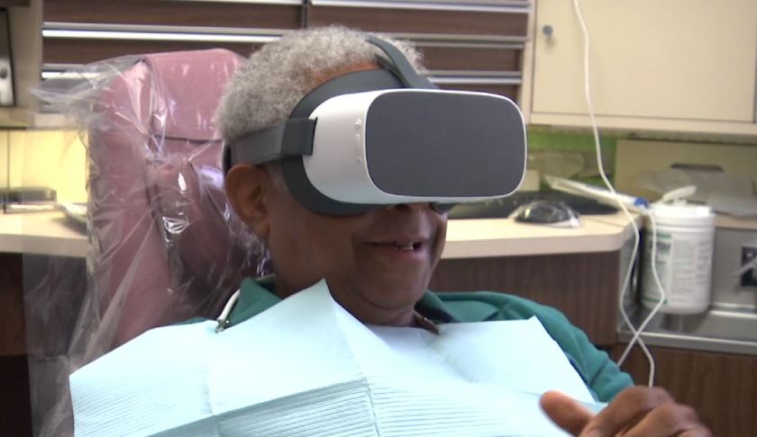 Patient uses VR technology while at the dentist. (Credit: WINK News)