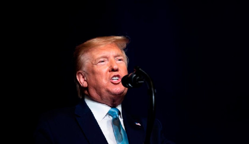 FILE: US President Donald Trump speaks during a 'Evangelicals for Trump' campaign event held at the King Jesus International Ministry on January 03, 2020 in Miami, Florida. (Photo by JIM WATSON / AFP) (Photo by JIM WATSON/AFP via Getty Images via CBS News/FILE)