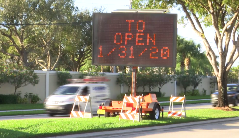 Sign shows that the roads are set to open by the end of January. (Credit: WINK News)