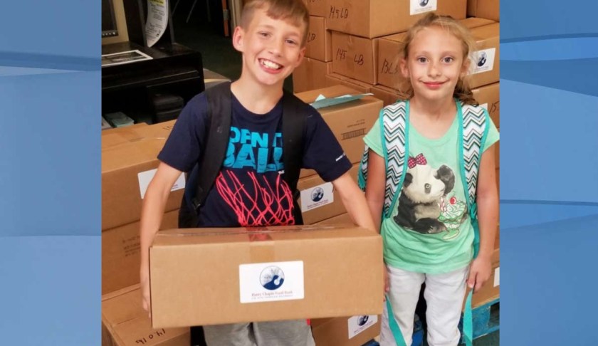 Two kids who are recipients of food provided by your donations. (Credit: Harry Chapin Food Bank)