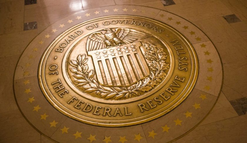 The Federal Reserve held interest rates steady despite renewed pressure from President Donald Trump to make deeper cuts. Pictured here, a gold plated seal inside the Eccles Building, the place of the Board of Governors of the Federal Reserve System and of the Federal Open Market Committee. (Credit: Brooks Kraft/Corbis News/Getty Images via CNN)