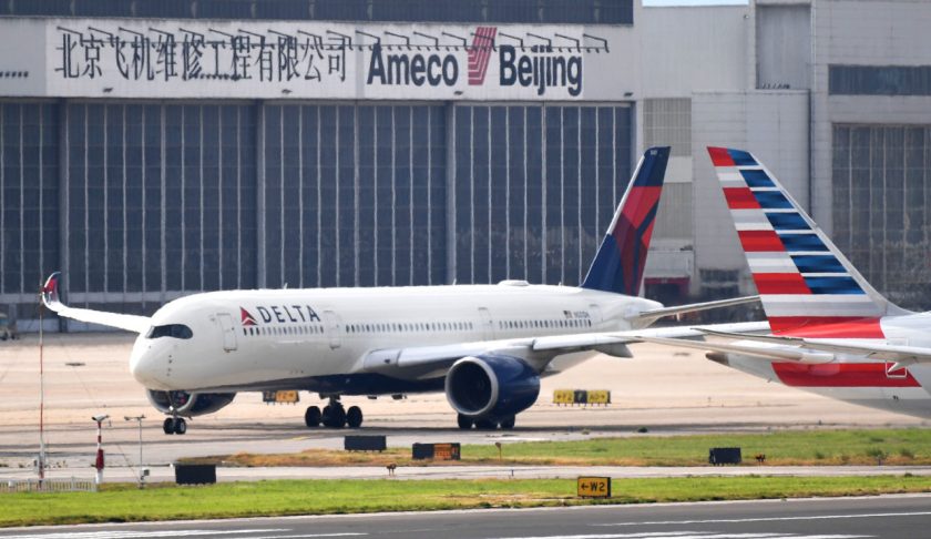 A Delta Airlines Airbus A350 aircraft waits to take off at Beijing airport on July 25, 2018. - Beijing hailed "positive steps" as major US airlines and Hong Kong's flag carrier moved to comply on July 25 with its demand to list Taiwan as part of China, sparking anger on the island. (Photo by GREG BAKER / AFP) (Photo credit should read GREG BAKER/AFP via Getty Images)