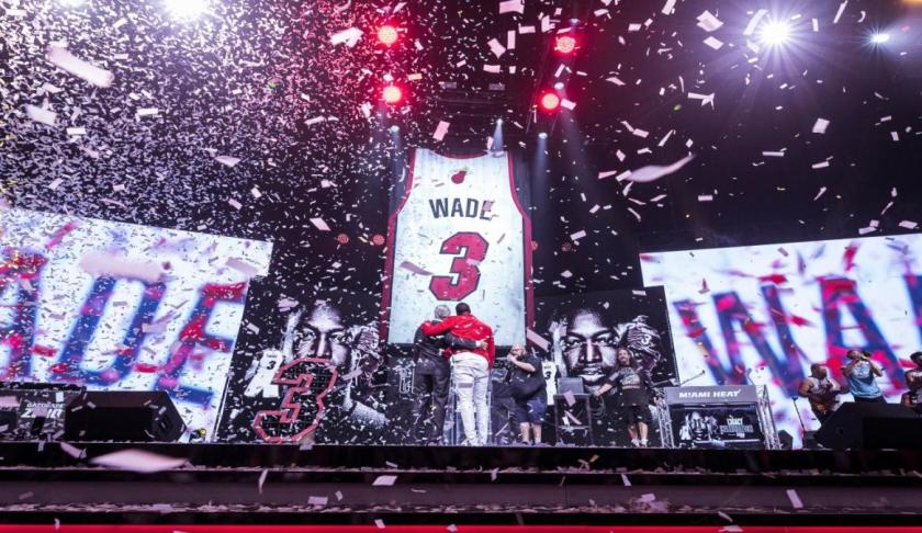 Dwyane Wade’s jersey is finally hanging from the rafters at the American Airlines Arena. The Heat legend’s jersey was raised to the ceiling with help from his wife, actress Gabrielle Union, and their baby girl. (Credit: CBS Sports)