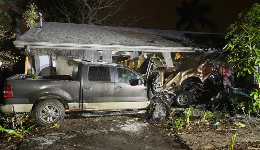 Pickup rams into a home. (Credit: WINK News)