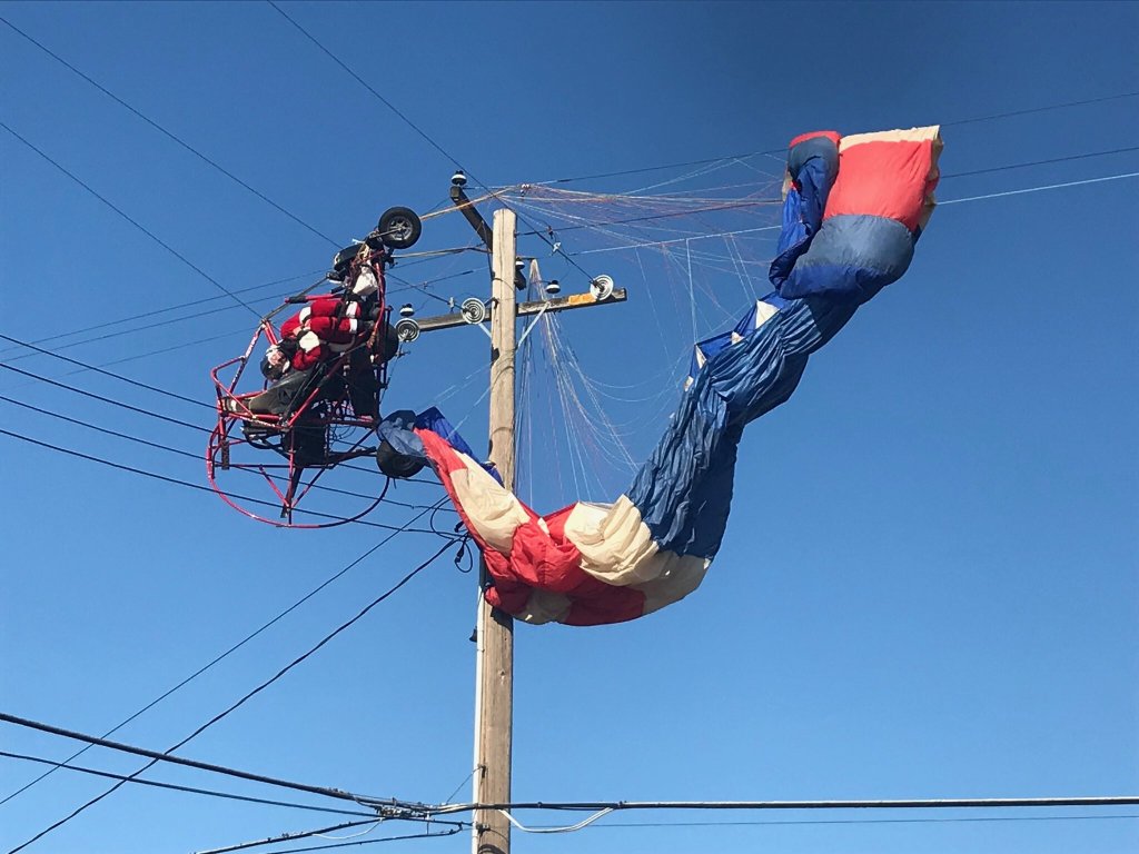 Paragliding Santa Claus rescued after getting caught in power lines in California